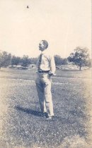 Edward G. Butler in a field